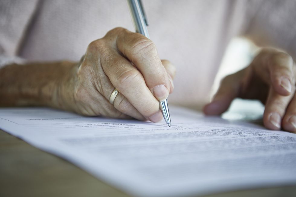 Woman writing a will