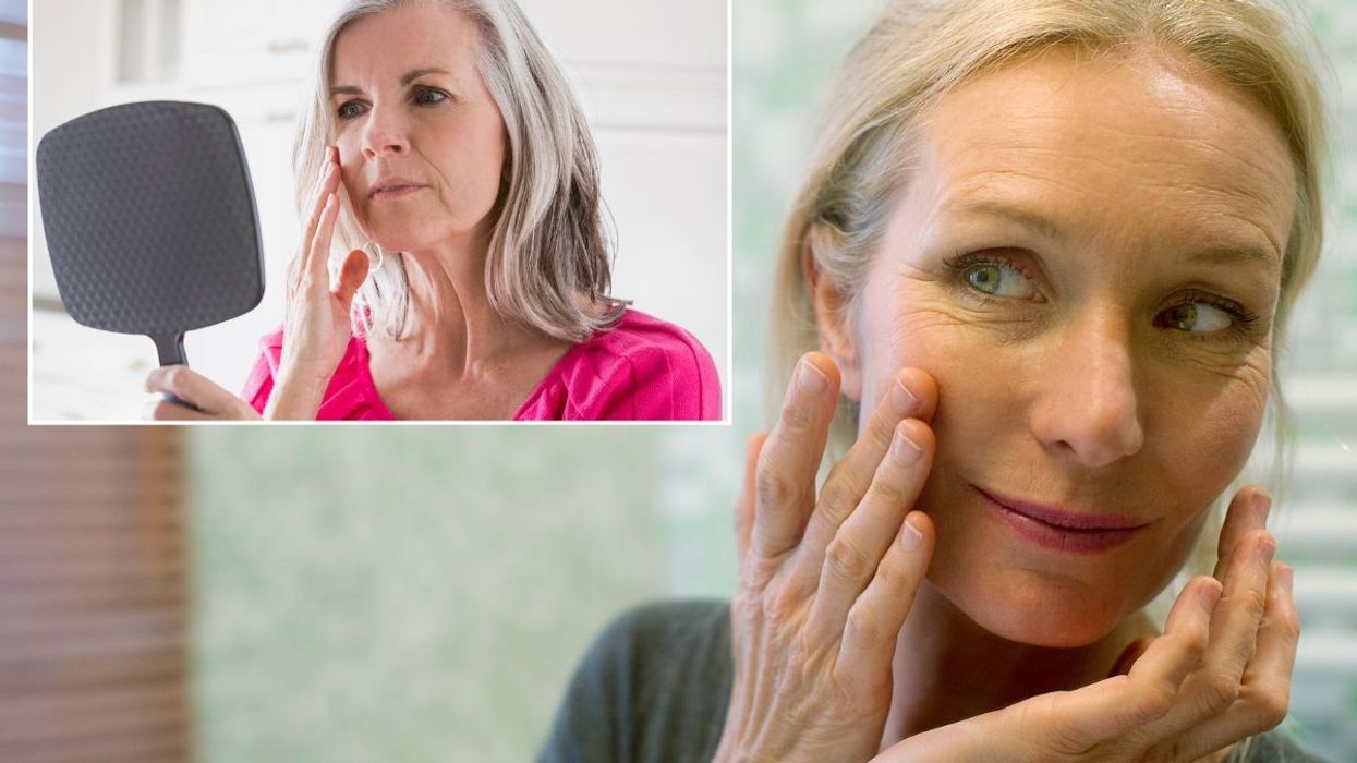 Women examining their skin in mirrors