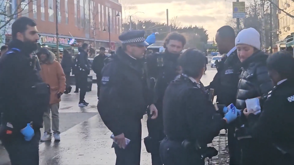 Women handcuffed after feeding pigeons
