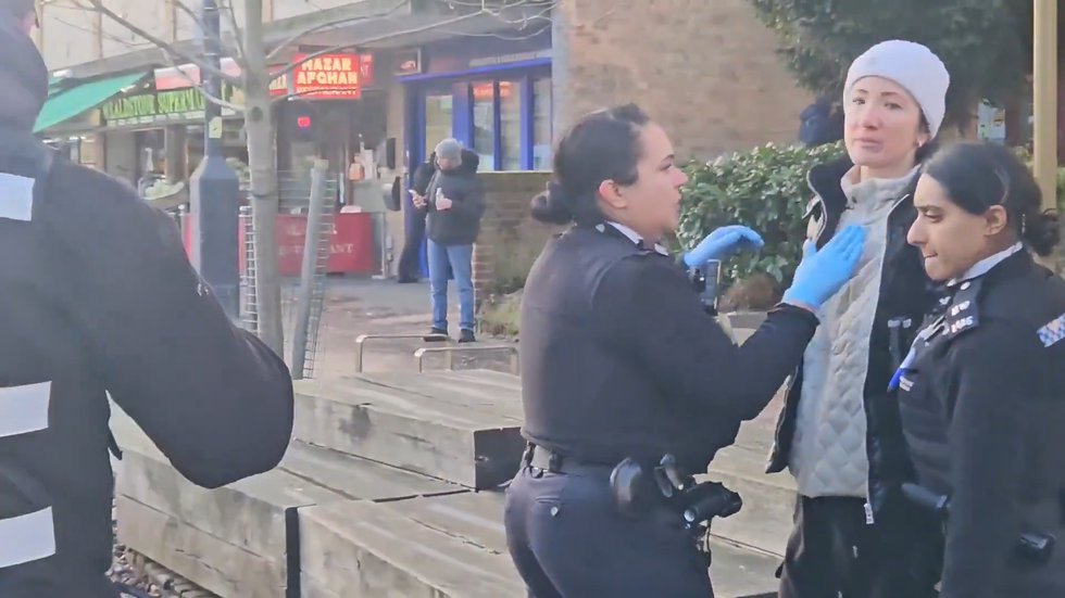Women handcuffed after feeding pigeons