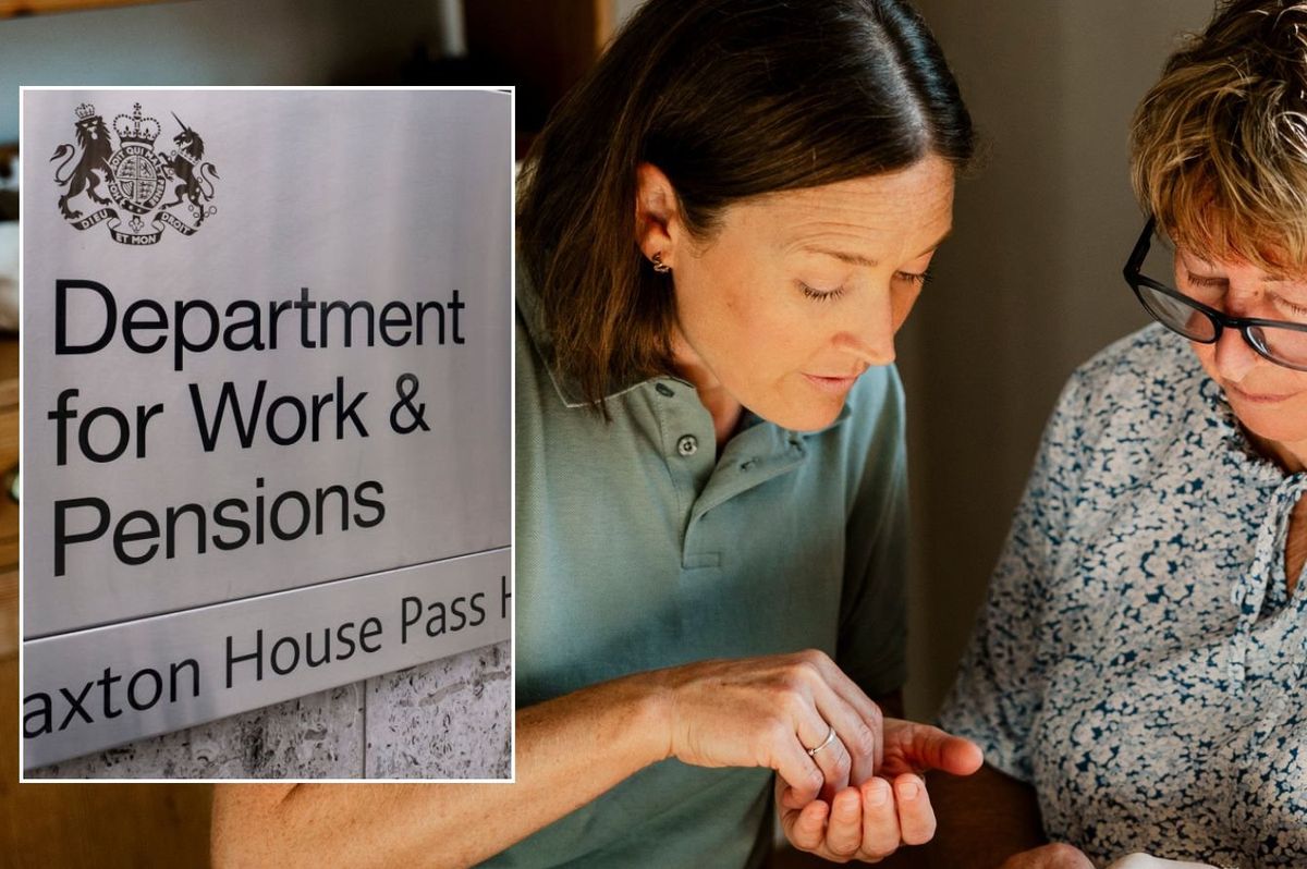 Women holding money, DWP sign