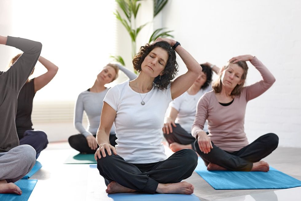Women in a group pilates class