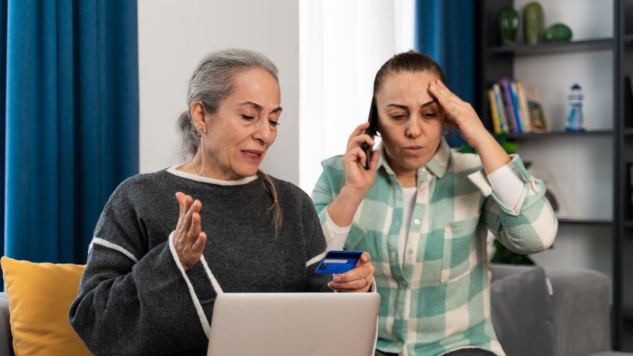 Women panicked at laptop