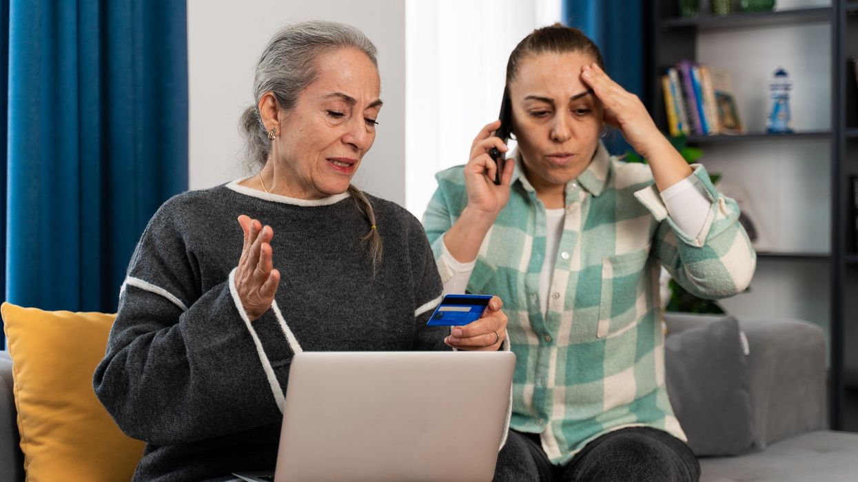Women panicked at laptop