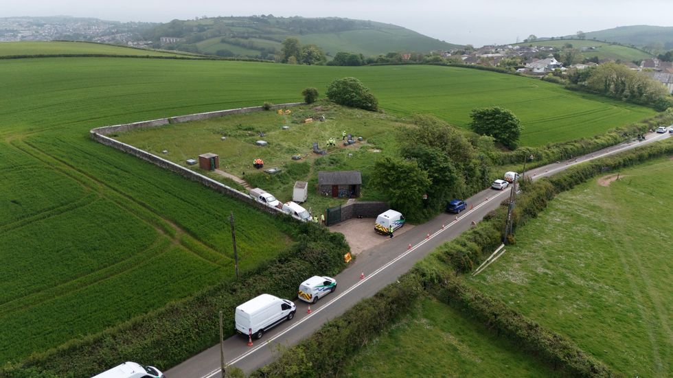 Workers at Hill Head reservoir in Devon
