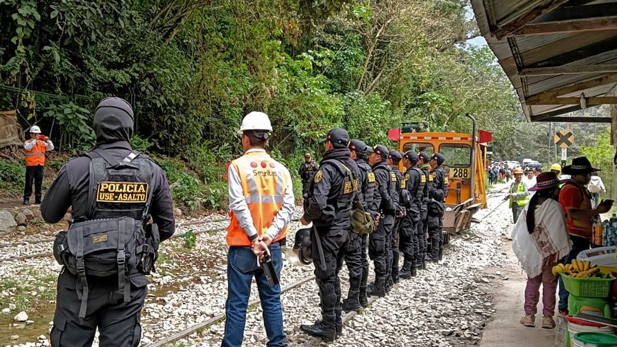 Workers block rail tracks at Machu Picchu