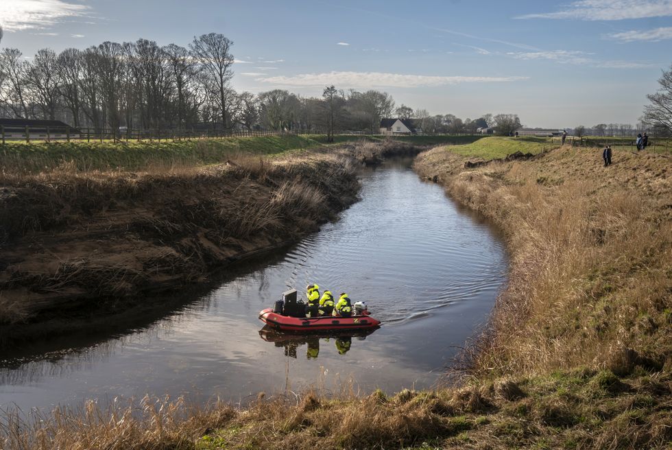 Workers from Specialist Group International, a private underwater search and recovery company, on the River Wyre, near St Michael's on Wyre, Lancashire, as they assist in the search for missing woman Nicola Bulley, 45, who was last seen on the morning of Friday January 27, when she was spotted walking her dog on a footpath by the river. Picture date: Monday February 6, 2023.