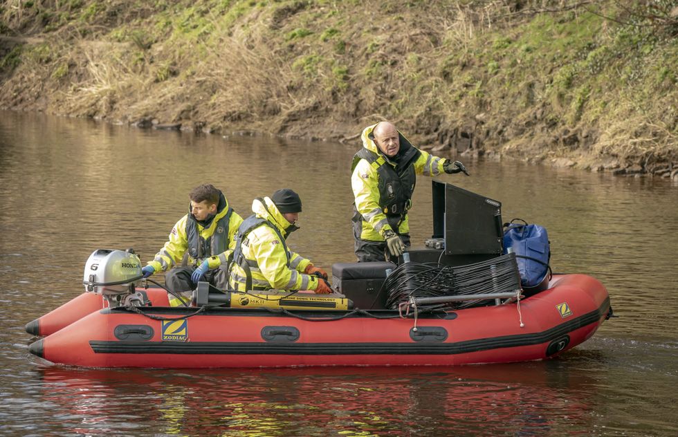 Workers from Specialist Group International, a private underwater search and recovery company, on the River Wyre, near St Michael's on Wyre, Lancashire, as they assist in the search for missing woman Nicola Bulley, 45, who was last seen on the morning of Friday January 27, when she was spotted walking her dog on a footpath by the river. Picture date: Monday February 6, 2023.