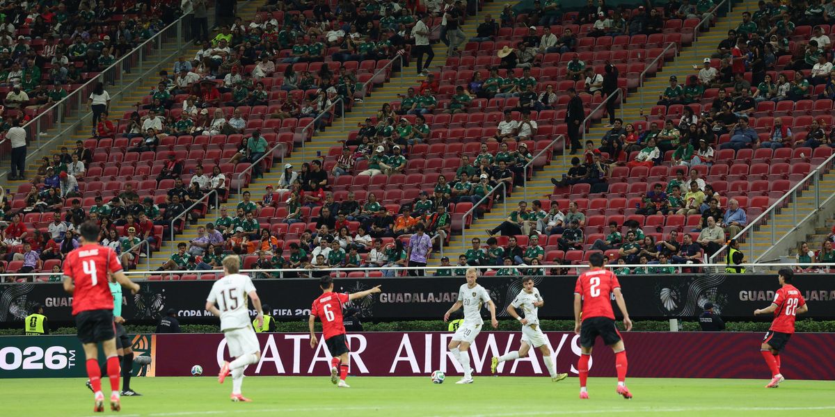 Hundreds of empty seats in second game of World Cup as organisers left embarrassed