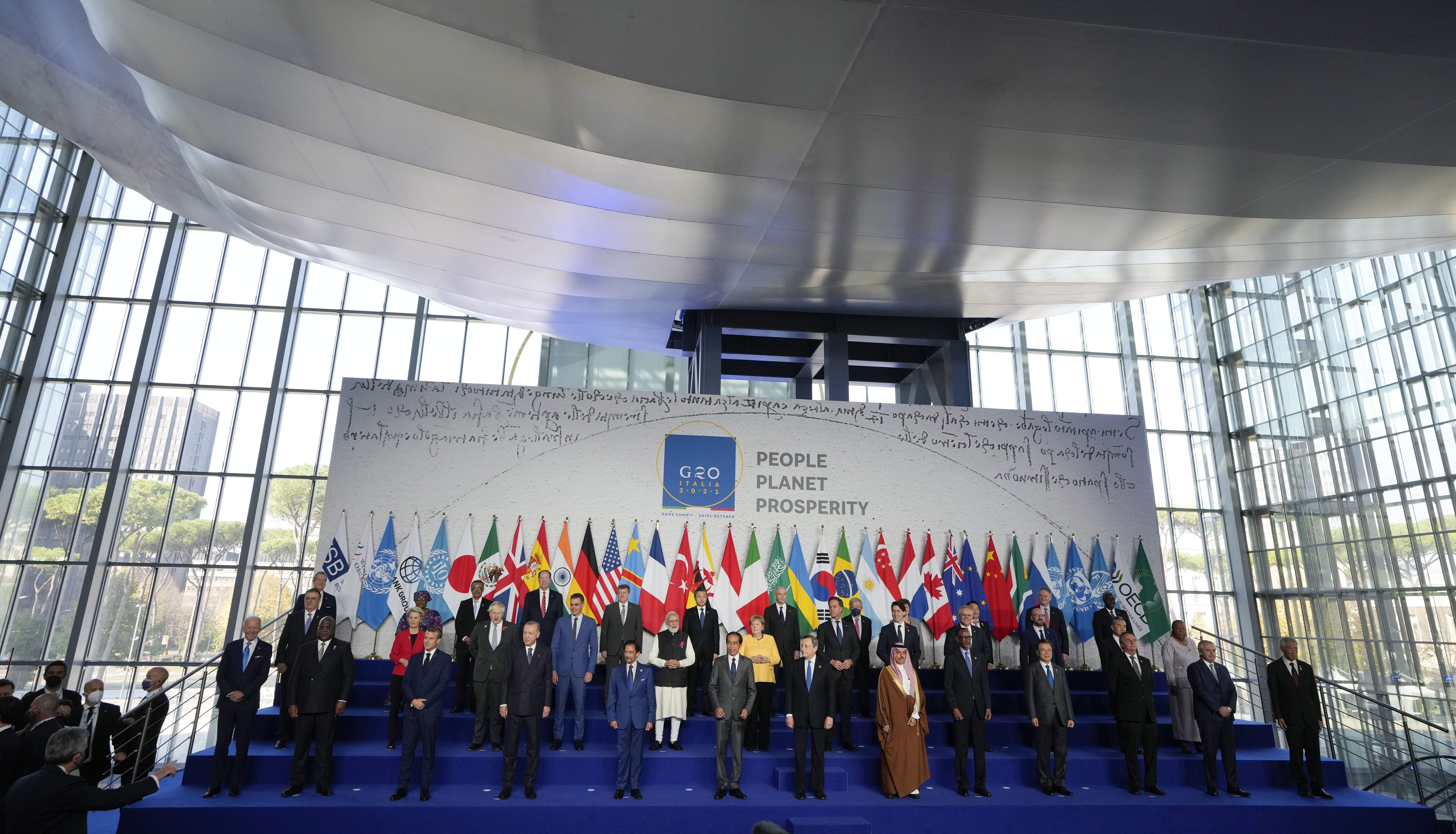 World leaders pose for a group photo at the La Nuvola conference center during the G20 summit in Rome, Italy. Picture date: Saturday October 30, 2021.