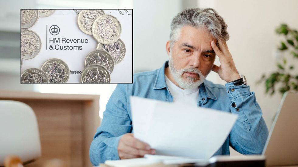 Worried man looking at tax bill