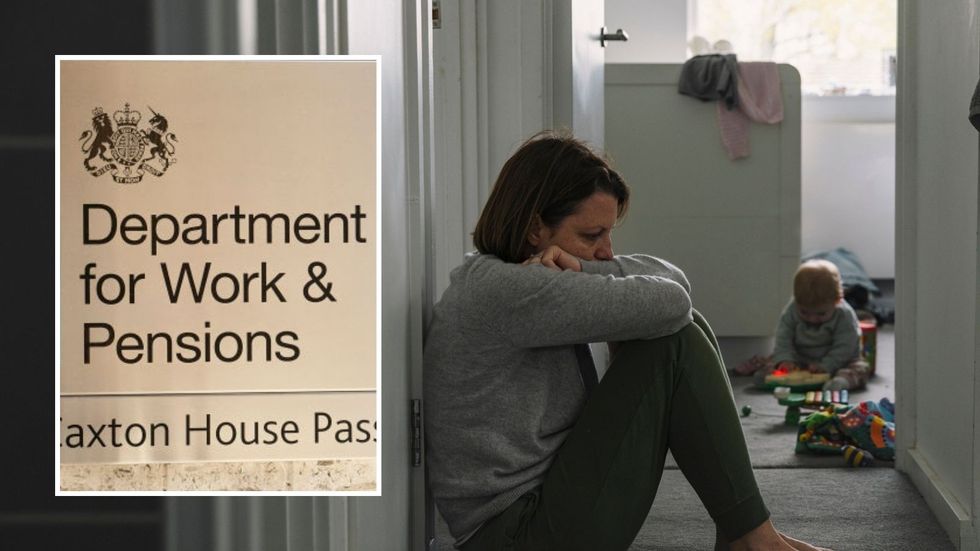 Worried mother with child and DWP sign