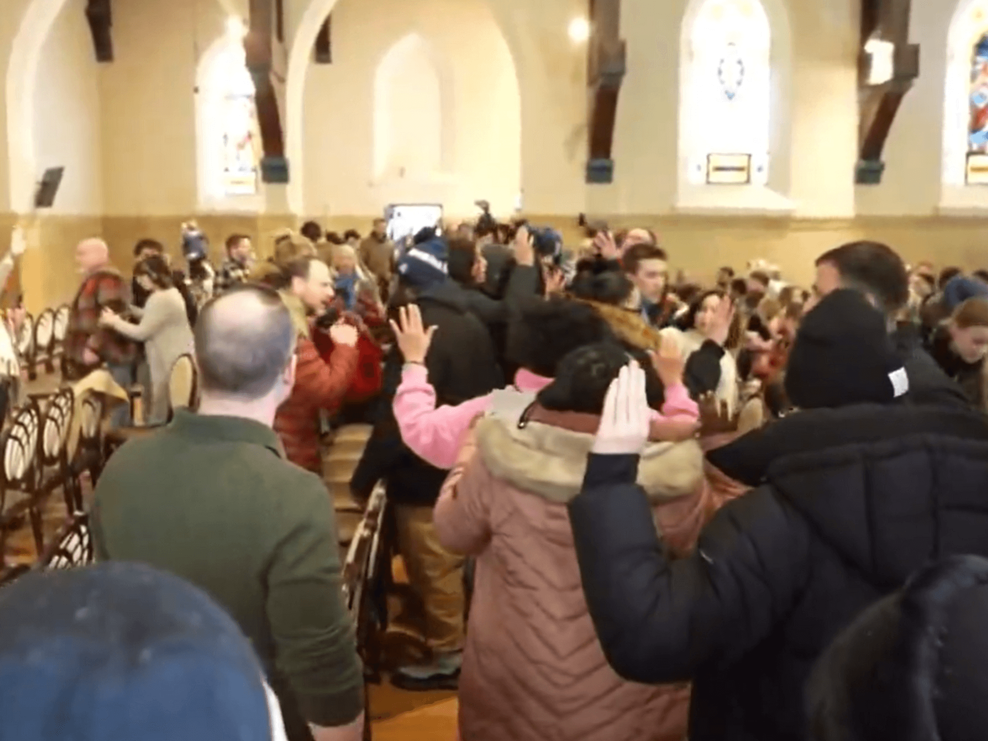 Worshippers confront activists