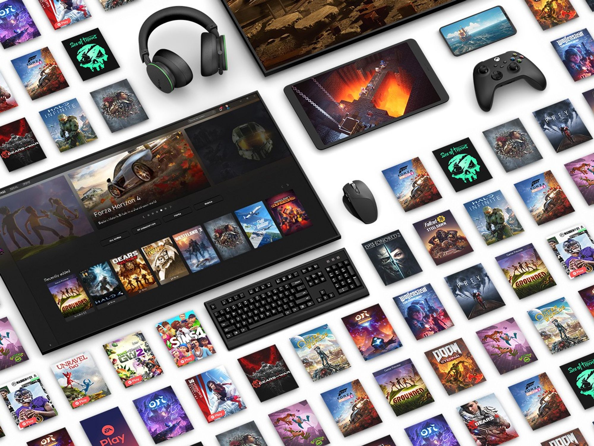 xbox video games computer keyboard and xbox wireless controllers laid out in a tiled pattern