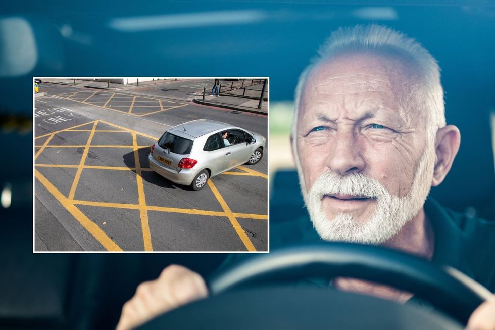 Yellow box junction and an elderly driver squinting
