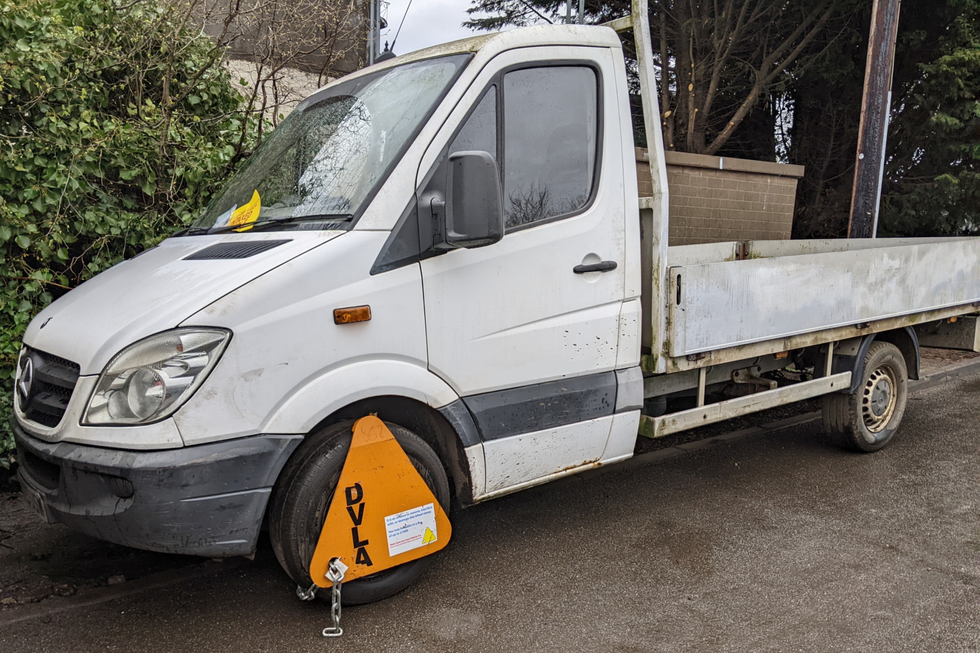Yellow DVLA wheel clamp