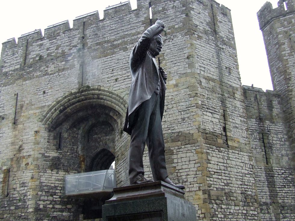 Yobs spray red paint over statue of former prime minister in horror act of vandalism