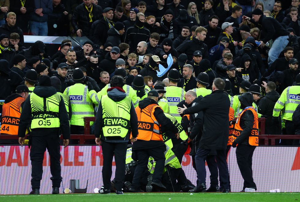 Young Boys fans threw seats at the police in chaotic scenes at Villa Park