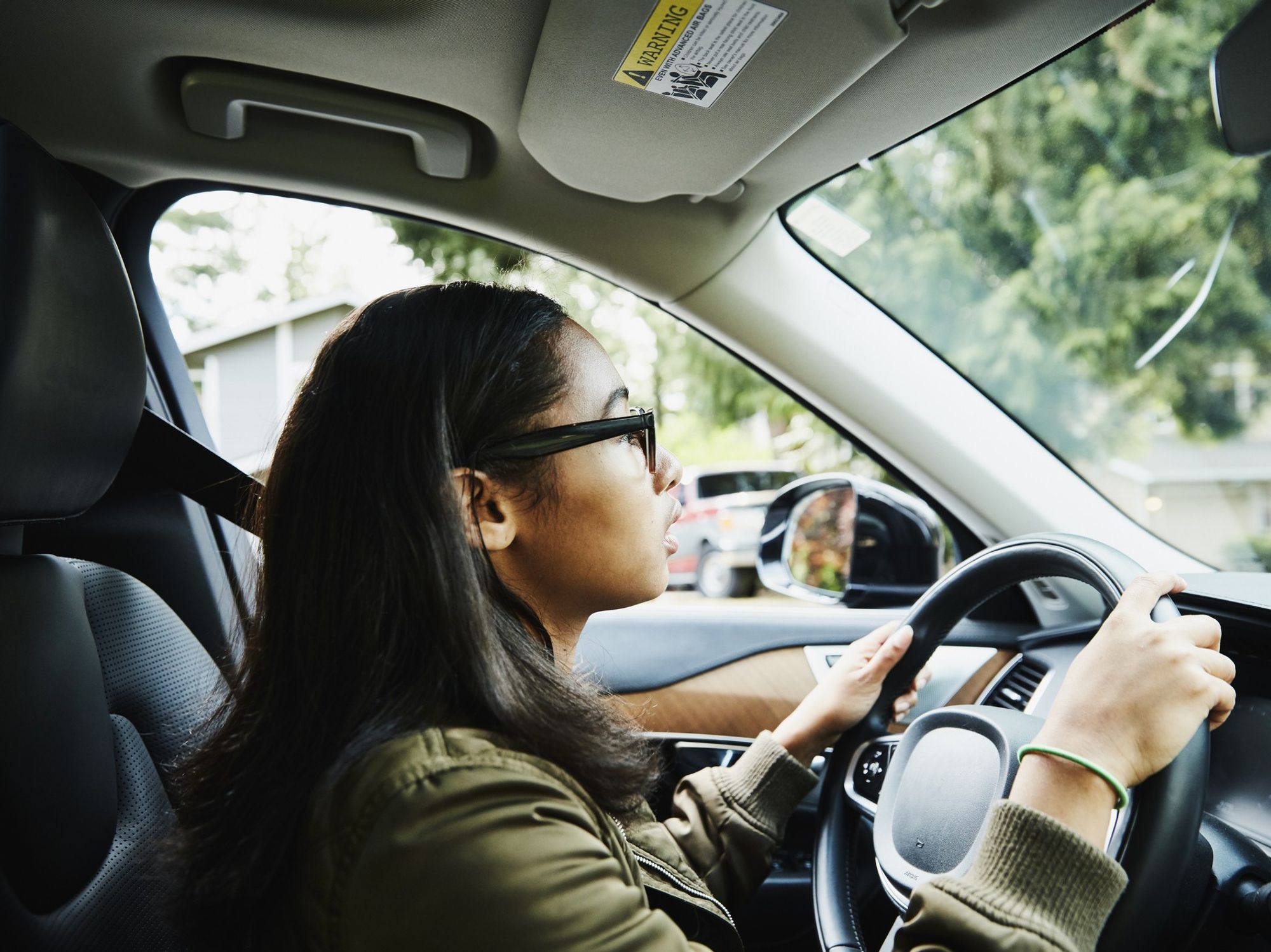 Young driver in vehicle