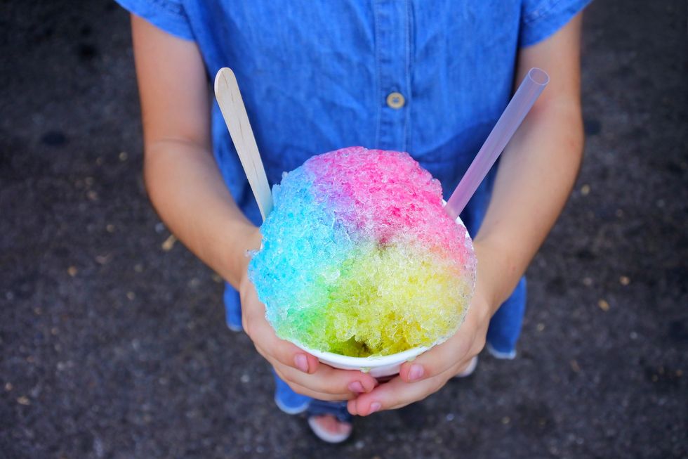 Young girl drinking slushie