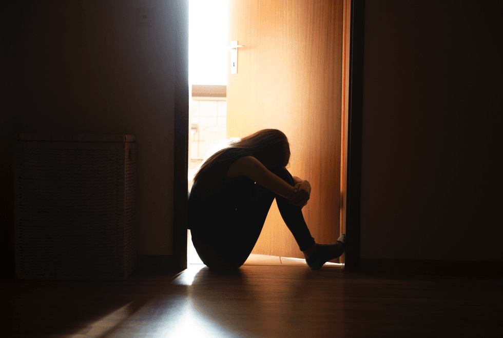 Young girl looking sad