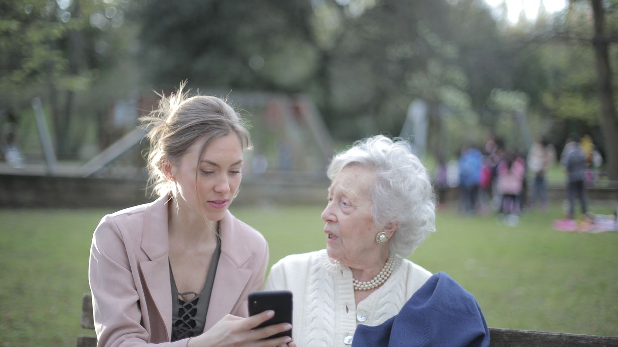 Younger woman with elderly woman