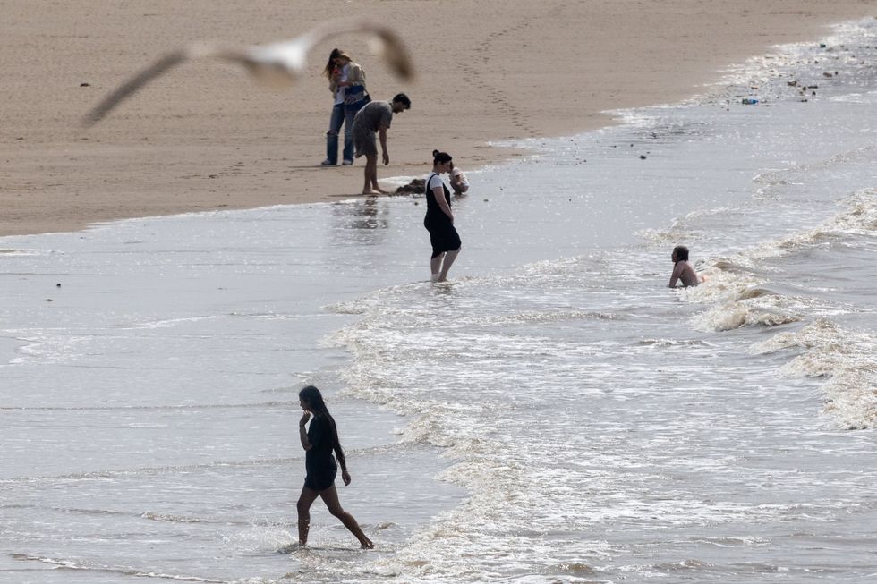 Youngsters swimming during heatwave