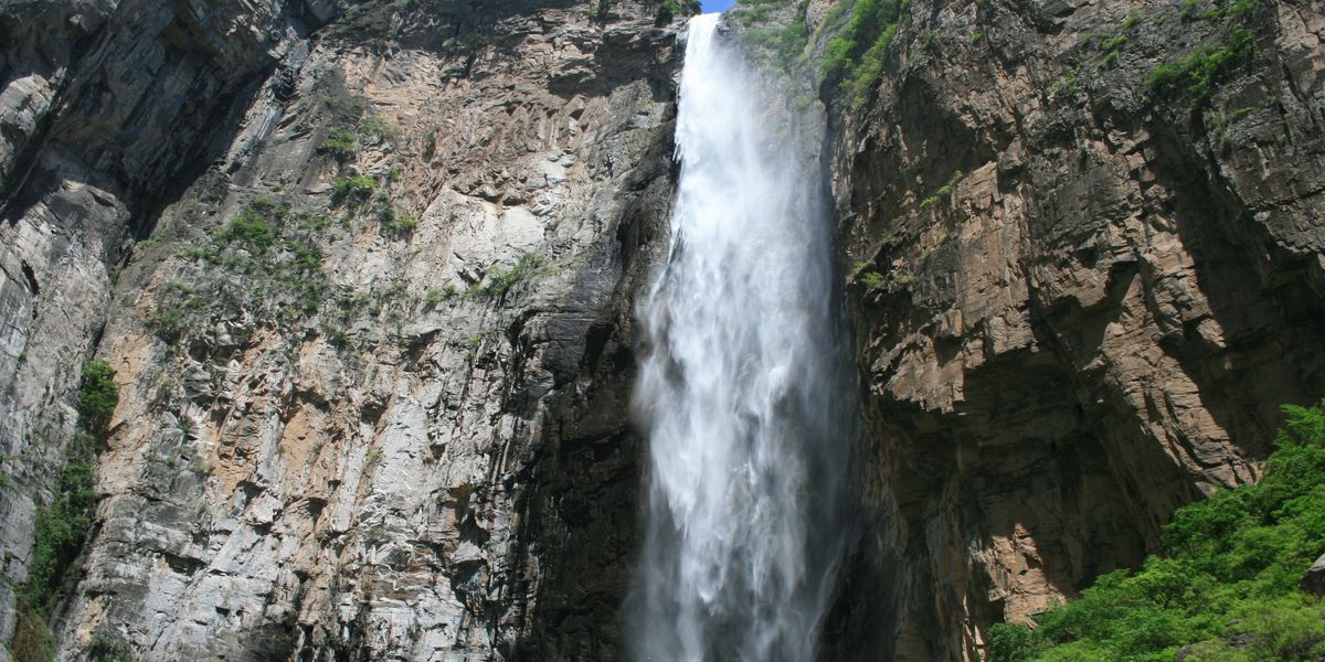 NextImg:Chinese official forced to apologise for misleading tourists after hiker finds waterpipe feeding country's largest waterfall