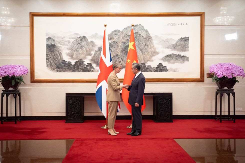 Yvette Cooper and China's Foreign Minister Wang YI