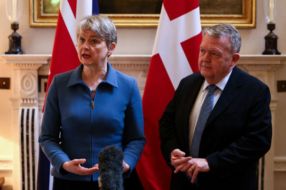 Yvette Cooper and Danish Foreign Minister Lars Loekke Rasmussen