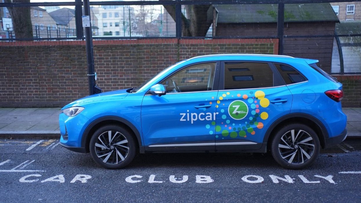 Zipcar electric vehicle parked in a car club parking space